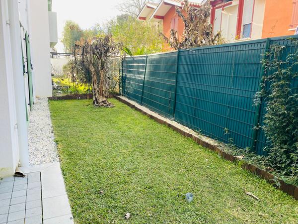 Appartement T3  avec jardinet, cellier et parkings