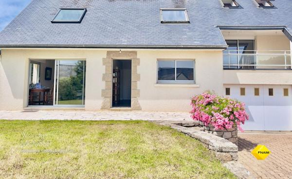 Maison familiale avec garage à bateau à deux pas de la plage