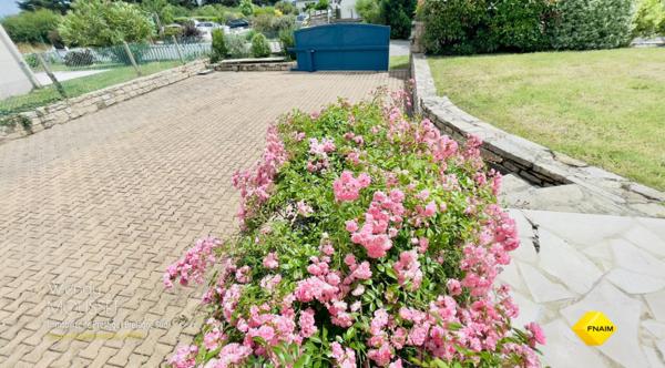 Maison familiale avec garage à bateau à deux pas de la plage