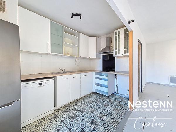 Appartement Cavalaire Sur Mer 4 pièce(s) d'environ 76 m² proche du port, des calanques et des commerces avec place de parking sécurisée et cave