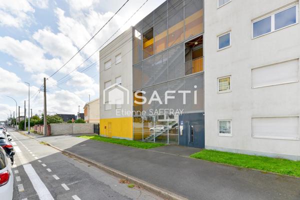 Appartement lumineux avec balcon et 2 places de parking