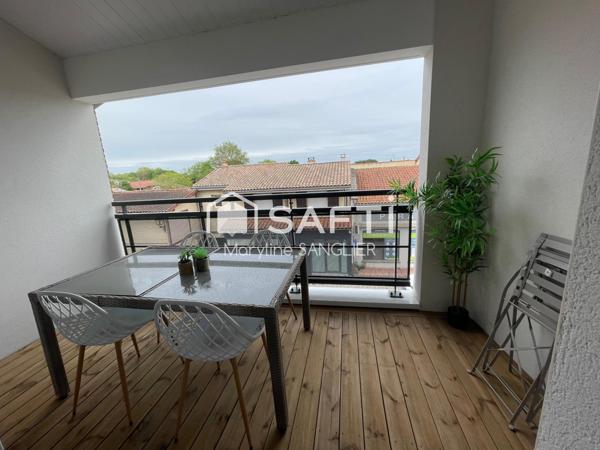 T2 neuf livré au coeur du village avec balcon