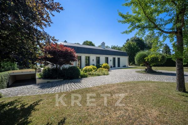 Propriété d'exception avec un parc de 1,6 hectares