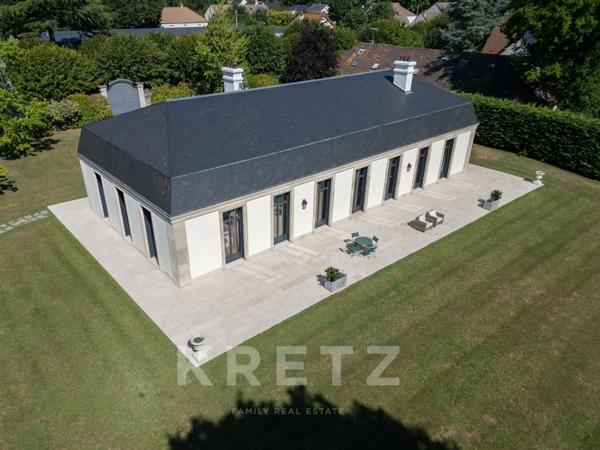 Propriété d'exception avec un parc de 1,6 hectares