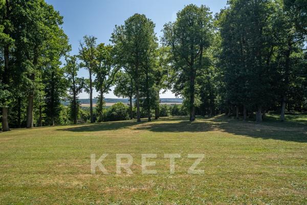 Propriété d'exception avec un parc de 1,6 hectares