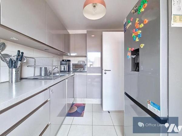 Appartement de type 4 dans résidence récente