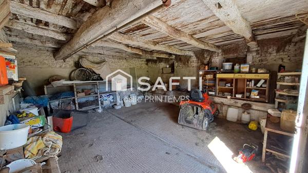 Grange à rénover sur 1500 m² de terrain constructible