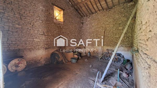 Grange à rénover sur 1500 m² de terrain constructible