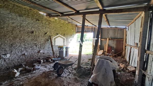 Grange à rénover sur 1500 m² de terrain constructible