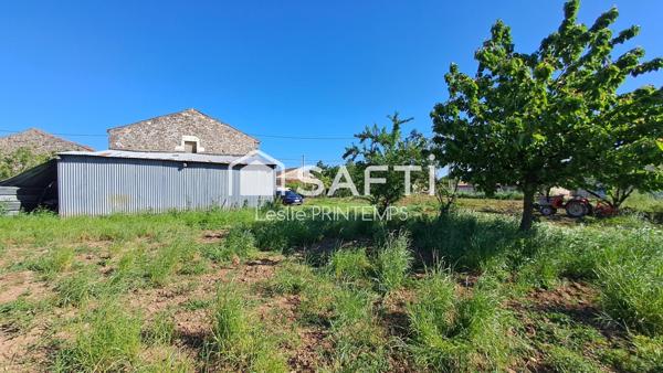 Grange à rénover sur 1500 m² de terrain constructible