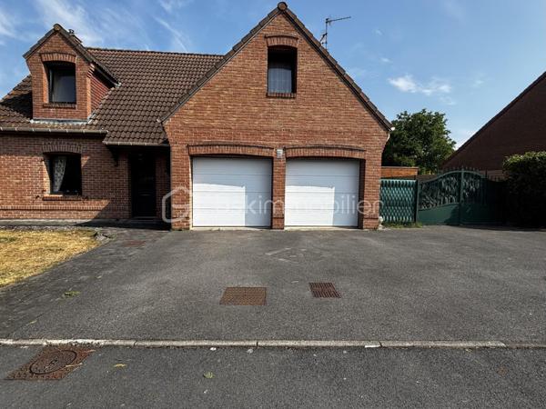 Venez découvrir cette belle maison individuelle construite en 2002, offrant de beaux volumes et un cadre de vie agréable.

 Au rez-de-chaussée :
• Une entrée avec rangement
• Une grande pièce de vie lumineuse de 45.83m²
• Une cuisine indépendante, meublée et équipée avec buanderie attenante
• Une agréable véranda chauffée et climatisée, idéale en toute saison de 27m²
• Un WC indépendant
• Un double garage avec portes motorisées

À l’étage :
• 4 chambres sur le même niveau, dont une suite avec sa salle de douche privative
• Une seconde salle de douche
• Un WC indépendant

Côté extérieur :
Profitez d’un vaste jardin offrant un bel espace de détente ainsi que de plusieurs place de parking devant la maison.

Côté technique :
✅ Huisseries double vitrage avec volet roulant électrique
✅ Insert à pellets
✅ Chauffage électrique
✅ Véranda avec climatisation réversible
✅ Ballon thermodynamique
✅Borne de recharge pour voiture électrique 

Une maison fonctionnelle, confortable située dans un secteur recherché.

Contactez moi dès maintenant pour organiser votre visite !