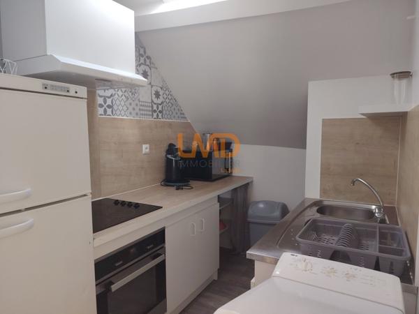 Immeuble de rapport rénové : 3 appartements + caves + garages + jardin