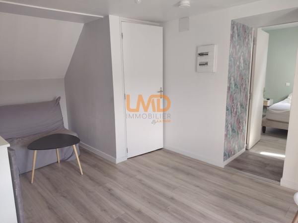 Immeuble de rapport rénové : 3 appartements + caves + garages + jardin