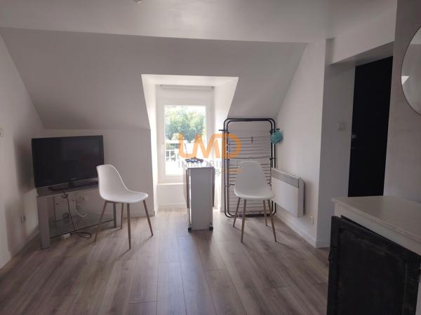 Immeuble de rapport rénové : 3 appartements + caves + garages + jardin