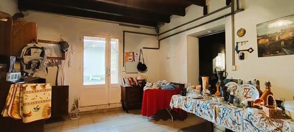 Albi: Maison T6 des années 40 de 161m2 avec demi-sous sol aménageable et terrain de 1496m2.