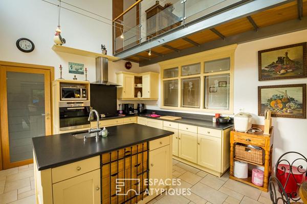 Maison en pierre avec un gîte