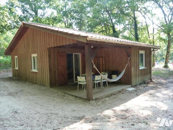 Ensemble immobilier au cœur des bois avec piscine
