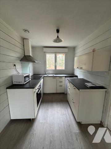 Ensemble immobilier au cœur des bois avec piscine