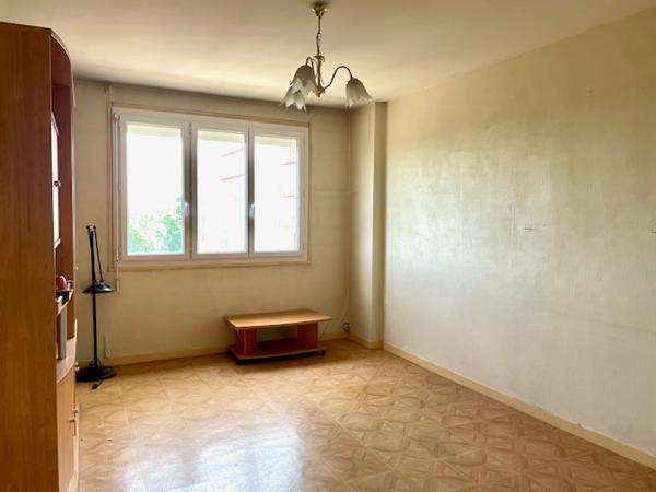 Appartement 3 chambres + garage fermé + place de parking au Puy Garnier