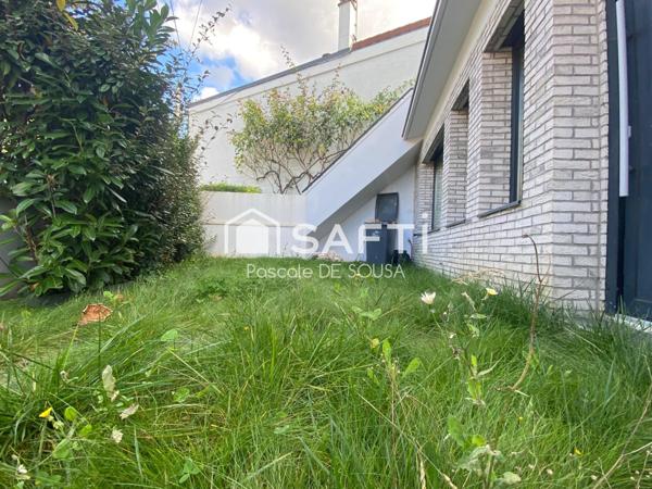 Appartement de 5 pièces avec 3 chambres en duplex inversé avec petit jardin