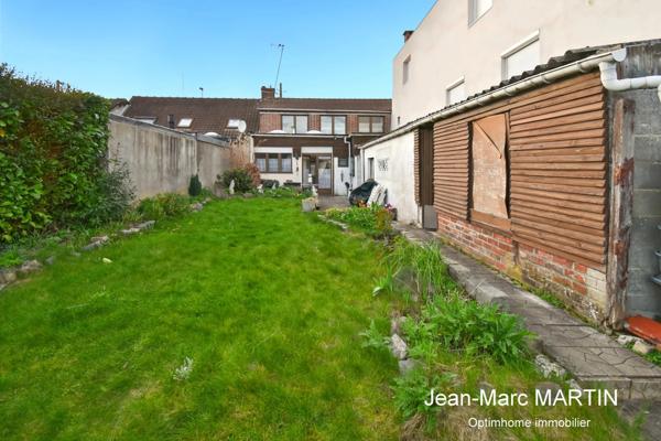 Maison à fort potentiel avec jardin et dépendances – idéal rénovation / investissement