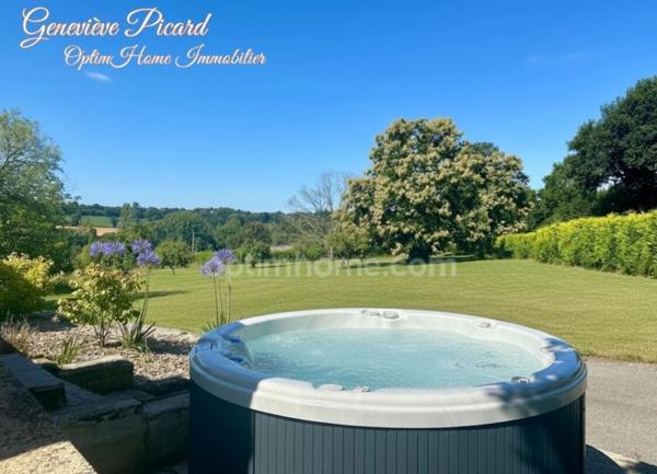 Propriété d'exception composée de quatre bâtisses harmonieusement intégrées dans leur environnement