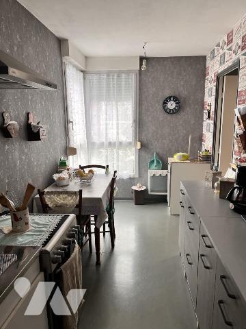 Appartement de type 3 avec terrasse, cave et garage