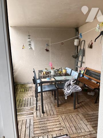 Appartement de type 3 avec terrasse, cave et garage