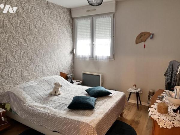 Appartement de type 3 avec terrasse, cave et garage