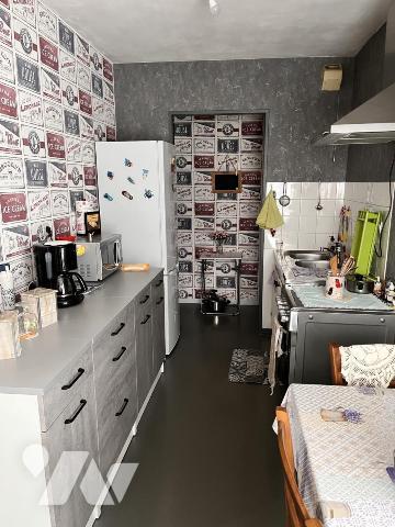 Appartement de type 3 avec terrasse, cave et garage