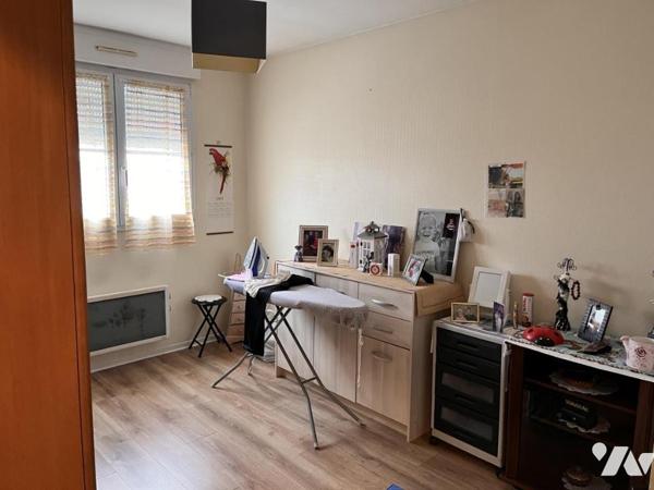 Appartement de type 3 avec terrasse, cave et garage