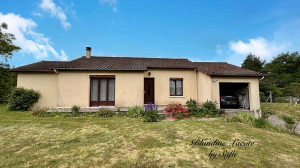Pavillon de plain-pied avec garage et jardin