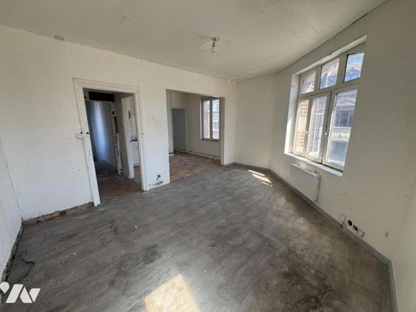 cambrai. immeuble locatif composé de trois appartements
