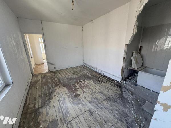 cambrai. immeuble locatif composé de trois appartements