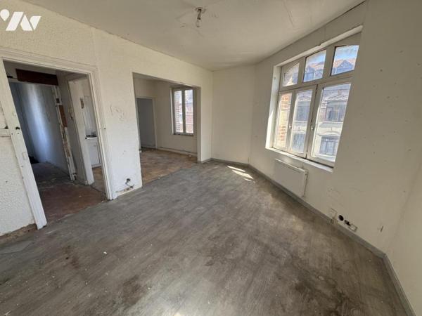 cambrai. immeuble locatif composé de trois appartements