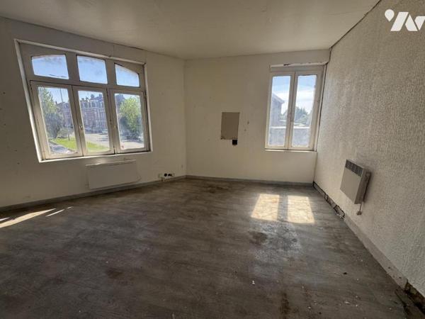 cambrai. immeuble locatif composé de trois appartements