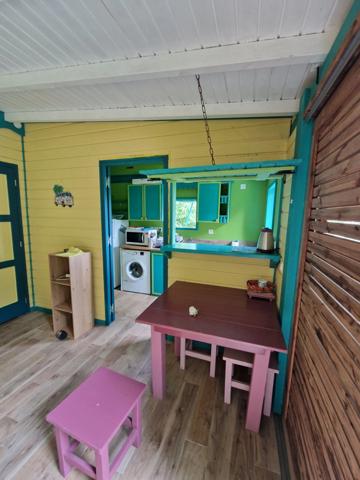 Pure villa Créole plage à pied + 2 bungalow F1 et F3 avec garage et piscine sur 1965 m² de terrain arboré