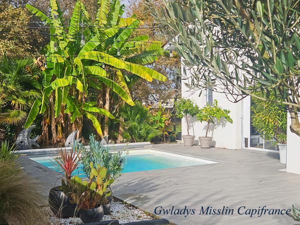 Magnifique propriété à EYSINES de 441 m² avec maison contemporaine de 9 pièces et un immense loft/local d'activité