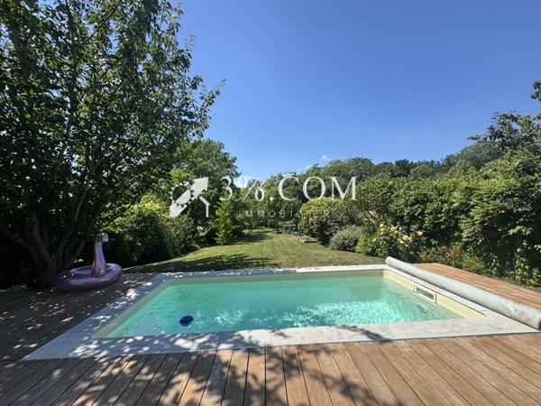 Maison 6 pièce(s) 3 chambre(s) 210 m²