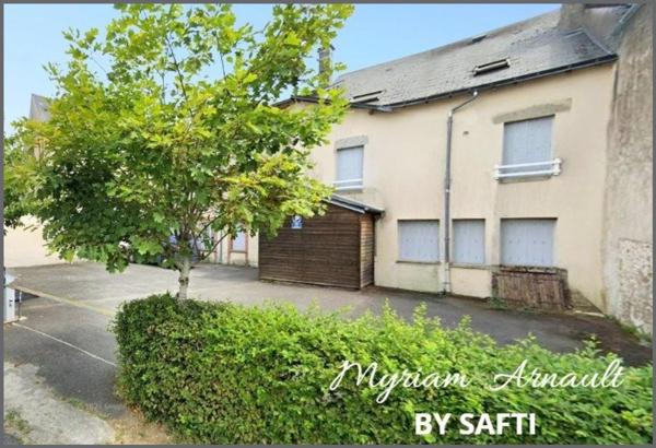 Immeuble de rapport 12 logements + parking privé sécurisé