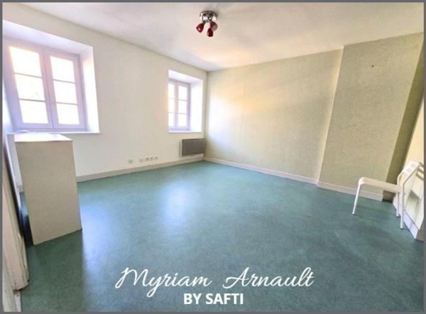 Immeuble de rapport 12 logements + parking privé sécurisé