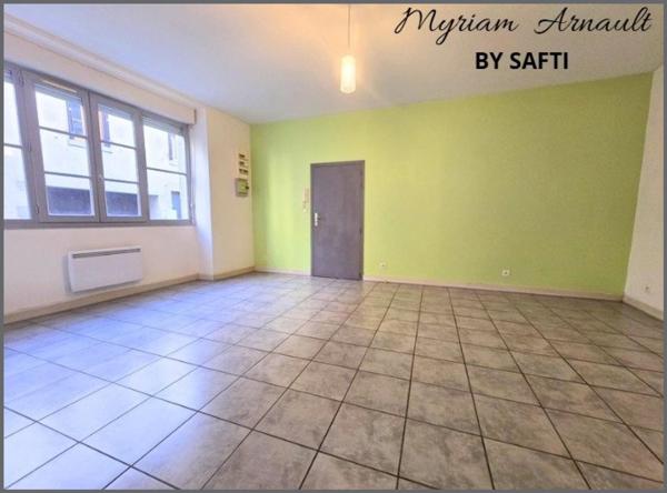 Immeuble de rapport 12 logements + parking privé sécurisé