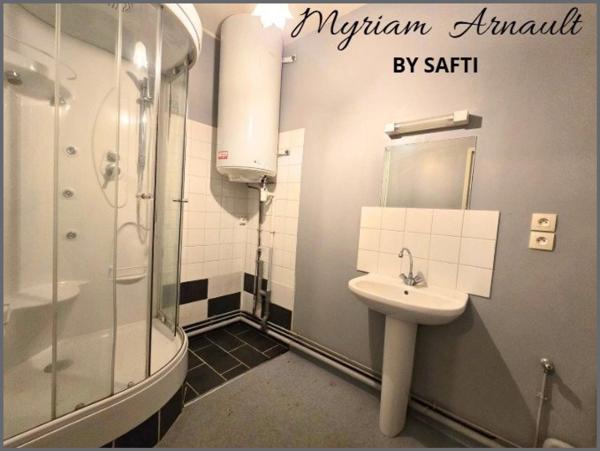 Immeuble de rapport 12 logements + parking privé sécurisé