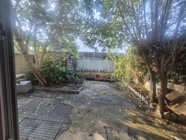 APPARTEMENT AVEC JARDIN