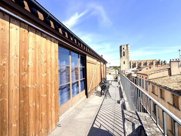 Appartement de charme avec terrasse et vue exceptionnelle sur le centre ville