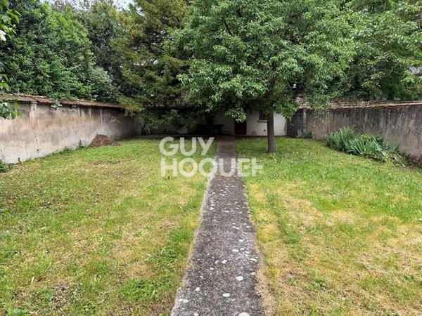 Maisonette / appartement avec 230 m2 de terrain