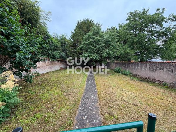 Maisonette / appartement avec 230 m2 de terrain