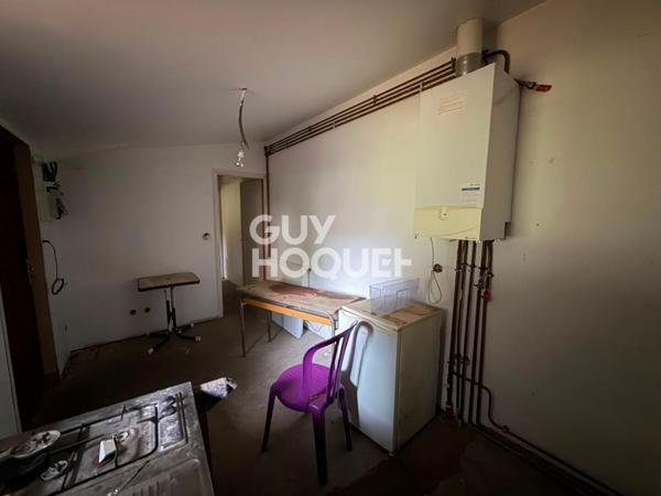 Maisonette / appartement avec 230 m2 de terrain