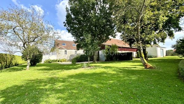 Découvrez cette magnifique propriété rénovée, de type "corps de ferme", située sur le  village calme de REBAIS à seulement 15 minutes de Coulommiers et de sa gare pour un accès rapide à Paris en 40 minutes. Parfaitement intégrée dans un environnement paisible, cette maison offre un cadre de vie exceptionnel.

Caractéristiques principales : Surface utile de 390 m² et habitable de 335 m². Terrain de 2600 m² sans vis-à-vis. Dépendances et garages  de 250 m² avec étages aménageables. Terrasses : 100 m² offrant de superbes vues dégagées. Double accès & Division foncière possible
- Rez-de-chaussée : Vaste entrée avec un salon-séjour lumineux de plus de 60 m², une cuisine séparée et entièrement équipée, une salle à manger de 17 m², un espace bureau de 9 m², salle d'eau avec WC, une autre salle de bains ainsi qu’une pièce de 25 m² aménageable en studio indépendant. L'arrière-cuisine et buanderie complètent ce niveau.

- Étage : Trois chambres (9 à 14 m²) et une suite parentale spacieuse de 41 m² comprenant une chambre climatisée, une salle de bain avec baignoire et douche, un WC, un dressing, et un espace bureau. L'étage abrite également un espace spa avec piscine à contre-courant, salle d'eau, WC, et une mezzanine dédiée aux loisirs. Le tout donnant sur une terrasse surélevée avec vue panoramique sur la vallée.

- Deuxième étage : Une salle de sport de 41 m² au sol, ainsi qu’un espace aménageable de 55 m².

- Extérieur : Profitez de l’immense terrain de 2600 m² sans vis-à-vis, agrémenté de terrasses et joliment arboré. Plusieurs dépendances et garages vous offrent de vastes espaces de rangement ou la possibilité d’aménager des studios ou ateliers.

> Équipements modernes : Chauffage au gaz de ville et pompe à chaleur pour un confort optimal (excellente performance énergétique). Portail et portes de garage motorisés, volets roulants électriques.
> Localisation idéale : Écoles et commerces à proximité, cette propriété est parfaite pour une vie familiale paisible à seulement 15 minutes de la gare reliant Paris.

Ne manquez pas cette opportunité unique d’acquérir une maison de caractère, alliant charme de l’ancien et confort moderne. 
Contactez-nous pour plus d'informations et organiser une visite.