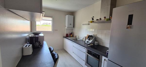 Charmant duplex situé dans le pentagone avec 2 chambres, mezzanine et garage sécirisé